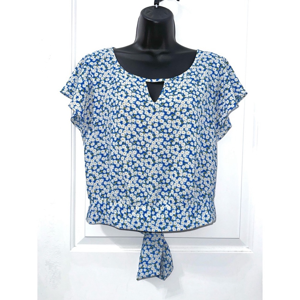 IZ Byer floral crop top featuring a blue and white daisy print, a v-neckline